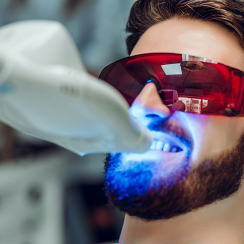 a teeth whitening patient during an appointment