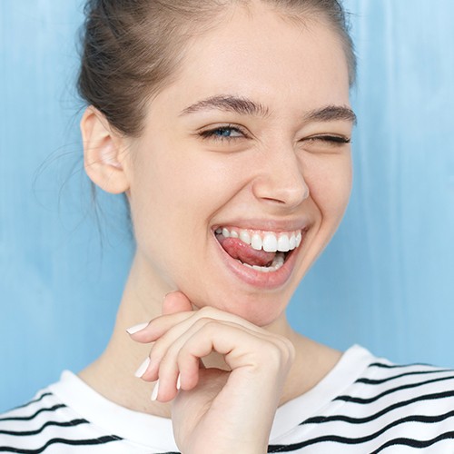 Woman sharing flawless smile after gum recontouring