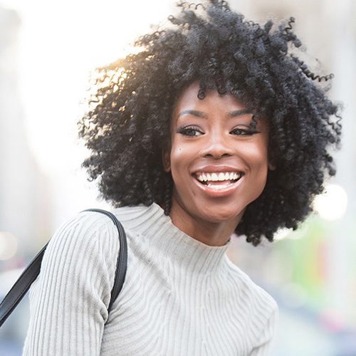 Woman with flawless skin after Botox and Juvederm treatment