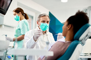 dentist treats patient