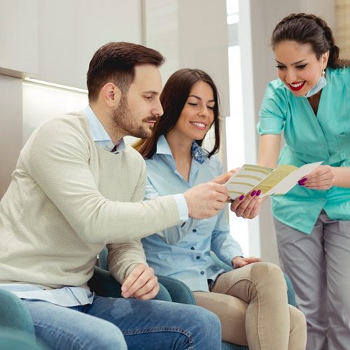 patients discussing insurance with their Delta Dental dentist