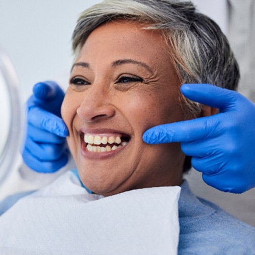 Closeup of smile with tooth that needs to be removed