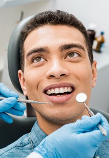 patient getting dental checkup 