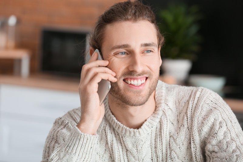 young man with dental implants 